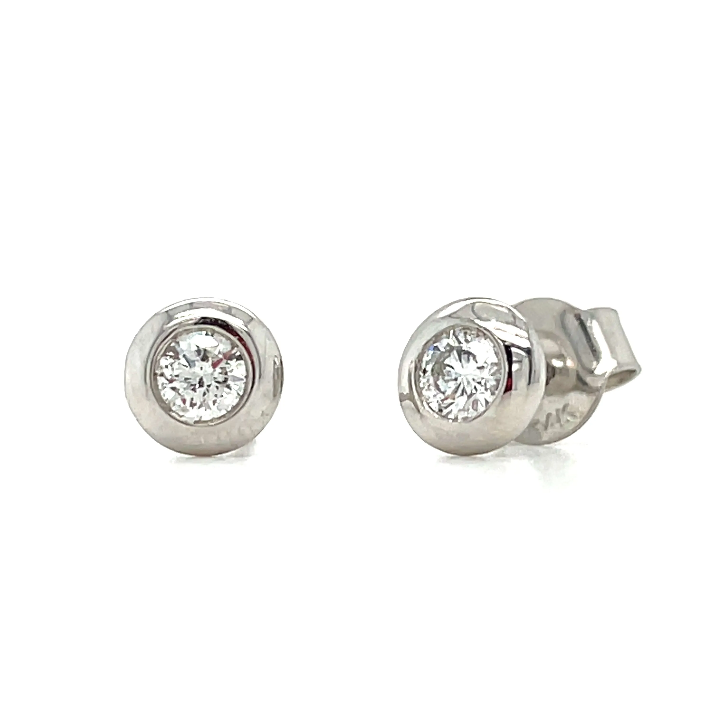 14KW Diamond Solitaire Stud Earrings. .20 CTW