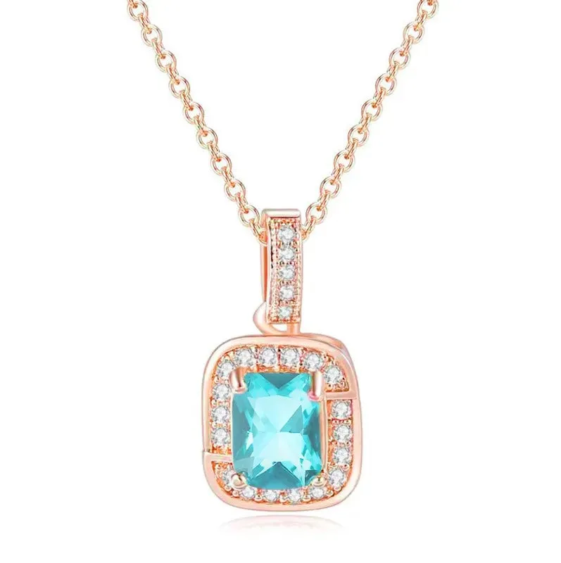 18K Rose Gold Created Aquamarine Princess Halo Pendant Necklace, Earrings and Tennis Bracelet Jewelry Set Plated