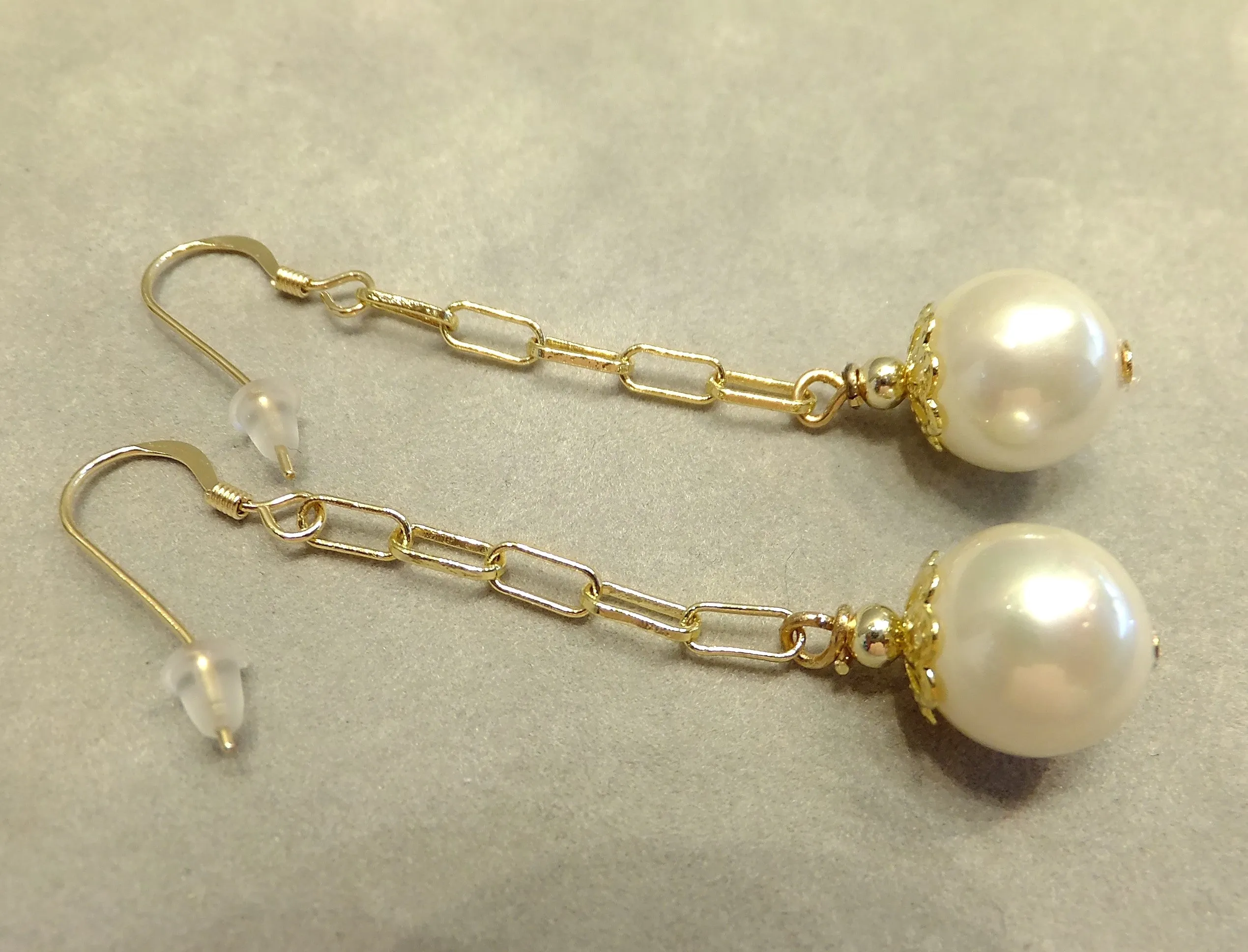 Long White Pearl Earrings in Gold