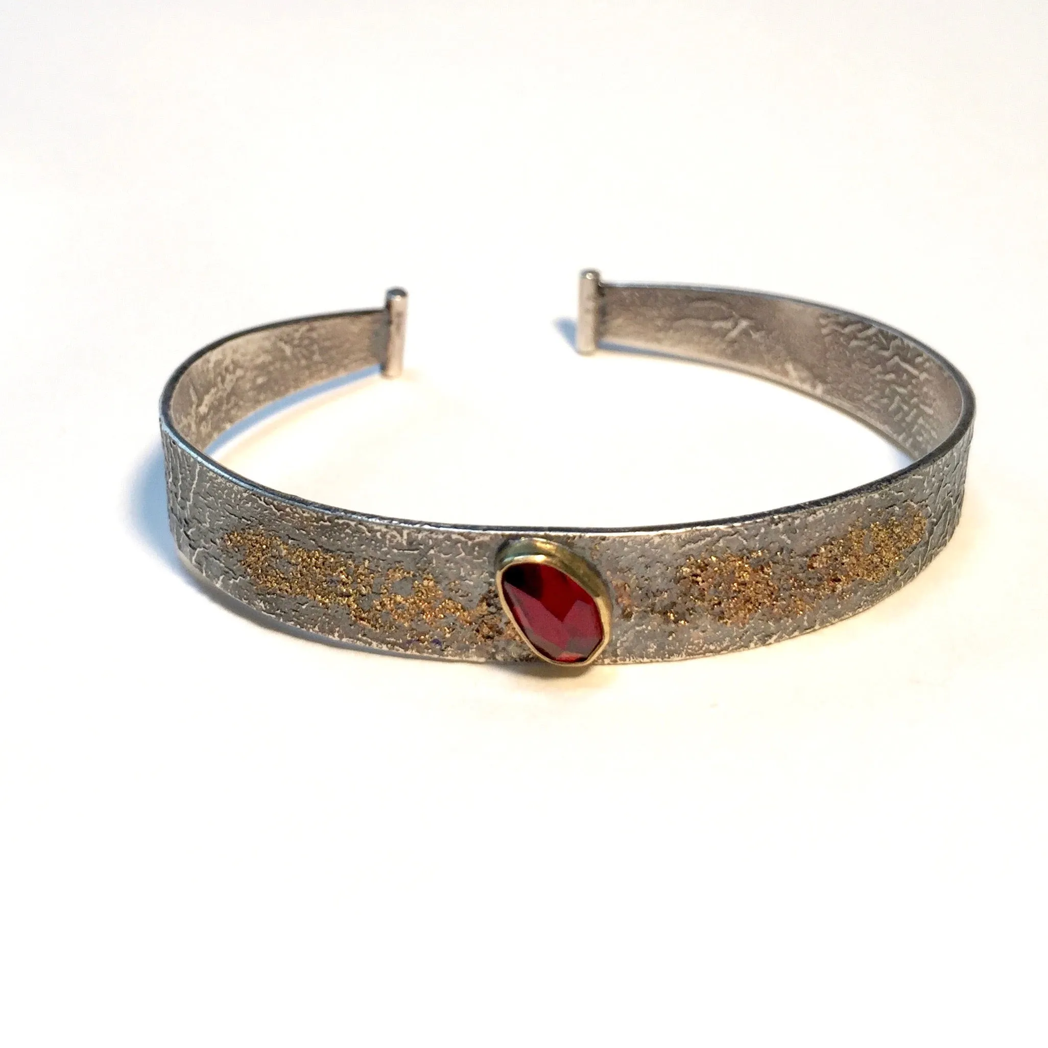 Reticulated Silver Cuff set with  rose cut Garnet and 18k gold powder accent