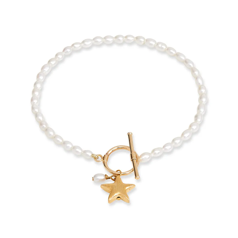 Stella cultured freshwater oval pearl bracelet with a gold-plated star charm