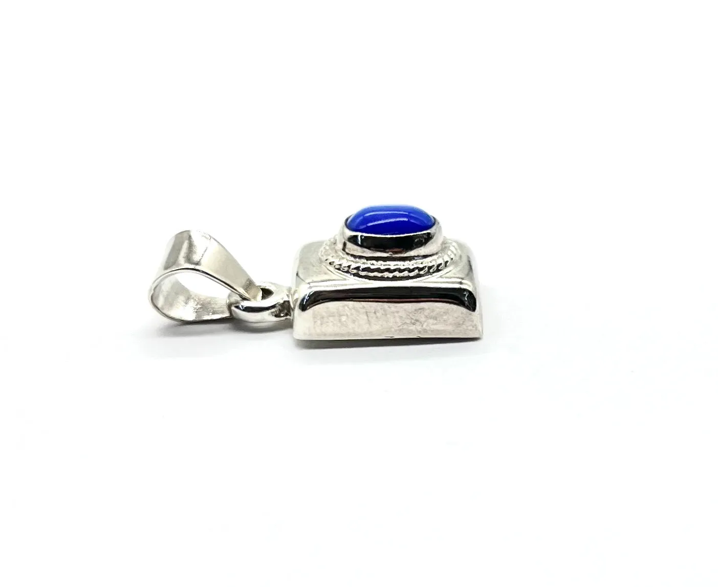 Sterling Silver Pendant with Blue Stone